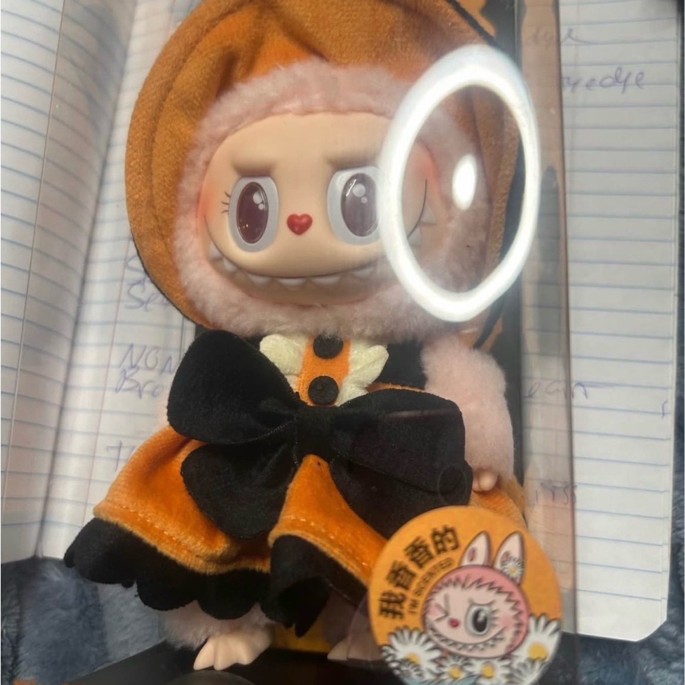 Plush Character Doll in Orange and Black Hooded Outfit